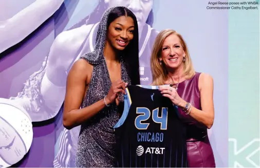  ?? ?? Angel Reese poses with WNBA Commission­er Cathy Engelbert.