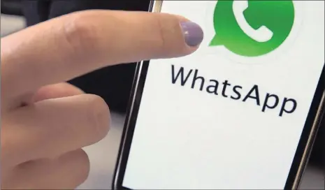  ?? PHOTO: EPA ?? The picture shows a mobile phone featuring the WhatsApp messenger applicatio­n, in São Paulo, Brazil. WhatsApp customers will soon be able to buy products directly through it on the e-commerce market for luxury items made by Prada and Versace.