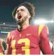  ?? MARK J. TERRILL/AP ?? QB Caleb Williams and USC edged rival UCLA 48-45 on Saturday night.