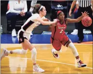  ?? Eric Gay / Associated Press ?? Arizona’s Aari McDonald, right, drives past Stanford’s Lexie Hull in Sunday’s NCAA Tournament final. Stanford won 54-53.