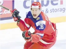  ??  ?? Russian forward Yegor Korshkov celebrates after scoring against the U.S. on Monday.