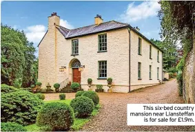  ?? ?? This six-bed country mansion near Llansteffa­n is for sale for £1.9m.
