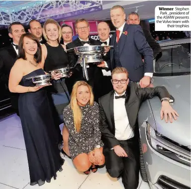  ??  ?? Winner Stephen Park , president of the ASMW presents the Volvo team with their trophies Jaguar F-Pace Suzuki Baleno