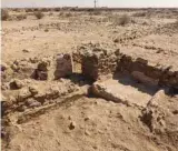  ?? ?? Right: Walls, arch and plastered basin at the Ain Mohamed site.