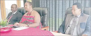  ?? (Pic: Nhlanganis­o Mkhonta) ?? Minister of Labour and Social Security Phila Buthelezi (C) addressing the media yesterday during a press conference, while Principal Secretary Makhosini Mndawe (R) and Under Secretary Reverend Anthony Masilela looks on.