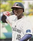  ?? Gene Wang / Getty Images ?? Didi Gregorius of Team Netherland­s reacts after hitting an RBI single to tie the game against Cuba.