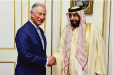  ?? John Stillwell / Associated Press 2013 ?? Charles, the Prince of Wales (left), with Sheikh Khalifa bin Zayed Al Nahyan, leader of the United Arab Emirates, in 2013.