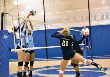  ?? Jessica Legaspi/For The Signal ?? Saugus volleyball’s Brianna Plunk and Melanie Goers block West Ranch player Sophie Bobal as she goes for a kill. The Centurions swept the Wildcats in the season opener at Saugus on Wednesday.