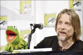  ?? TONYA WISE / INVISION 2015 ?? Kermit the Frog and puppeteer Steve Whitmire attend “The Muppets” panel at ComicCon Internatio­nal in San Diego. ABC News and The Hollywood Reporter reported last week that Whitmire is no longer performing the character.