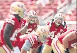  ?? EZRA SHAW — GETTY IMAGES ?? The San Francisco 49ers’ Trey Lance (5) lines up at the line of scrimmage against the Las Vegas Raiders during their preseason game at Levi’s Stadium on Sunday in Santa Clara.