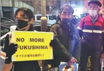  ?? JIANG XUEQING / CHINA DAILY ?? Japanese citizens rally in Tokyo on Monday, demanding an immediate end to the discharge of nuclear-contaminat­ed water into the ocean.