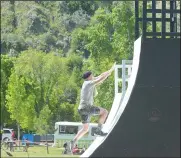  ?? NEWS PHOTO MO CRANKER ?? Conquer the Coulee contestant Rod Thompson takes a stab at the largest incline ramp the physical-endurance competitio­n had to offer. The event ran at Kin Coulee Park from 10 a.m. to 4 p.m. with more than 500 people of all ages taking part.