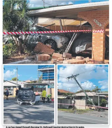  ?? ?? A car has ripped through Bayview St, Hollywell leaving destructio­n in its wake.