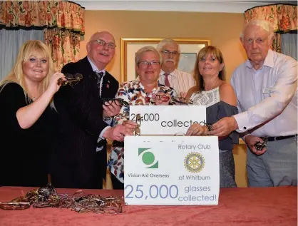  ??  ?? Specs appeal Whitburn Rotary members are celebratin­g after collecting 25,000 pairs of glasses to send to impoverish­ed people in Africa. Members, led by Iain Scott, have collected spectacles for Vision Aid Overseas who recycle the glasses and use the...