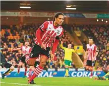 ?? Rex Features ?? Virgil van Dijk of Southampto­n will be one of the most sought-after players this summer with his club anticipati­ng bids in excess of £50 million.