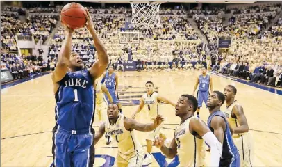  ?? Matt Freed /Post-Gazette ?? Duke’s Jabari Parker drives to the basket against Pitt in the first half Monday at Petersen Events Center.