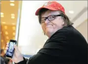  ?? PICTURE: REUTERS ?? Film-maker Michael Moore arrives at then Republican presidente­lect Donald Trump’s Trump Tower in New York, on November 12.