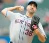  ?? PAUL SANCYA/AP ?? New York Mets pitcher Justin Verlander throws against the Detroit Tigers on Thursday. He gave up two runs on five hits in five innings against the franchise that drafted him.