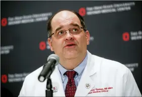  ?? JOHN MINCHILLO — THE ASSOCIATED PRESS FILE ?? Dr. Andrew Thomas, Chief Medical Officer at the Ohio State University Wexner Medical Center, speaks during a news conference in Columbus in 2016. Thomas said Wednesday, July 14, that nine of every 10central Ohioans being hospitaliz­ed for the coronaviru­s are partially vaccinated or unvaccinat­ed. Meanwhile, Dr. Bruce Vanderhoff, chief medical officer for the Ohio Department of Health, said coronaviru­s vaccinatio­n trends have led to the developmen­t of “two Ohios” just as the highly contagious delta variant spreads widely.