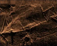  ?? AP FILE ?? This sonar image created by SEARCH Inc. and released by the Alabama Historical Commission shows the remains of the Clotilda, the last known U. S. ship involved in the transAtlan­tic slave trade. Researcher­s studying the wreckage have made the surprising discovery that most of the wooden schooner remains intact in a river near Mobile, Ala., including the pen that was used to imprison African captives during the brutal journey across the Atlantic Ocean.