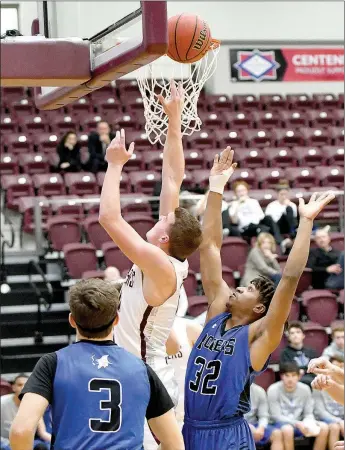  ?? Bud Sullins/Special to Siloam Sunday ?? Siloam Springs senior Harrison Kretzer powers his way to a layup Tuesday in the Panthers’ 52-30 win against Rogers inside Panther Activity Center.