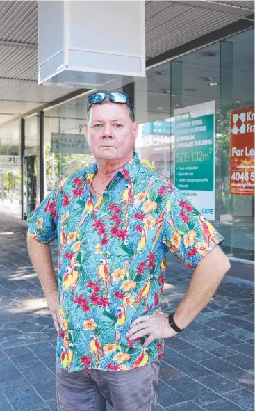  ?? Picture: BRENDAN RADKE ?? INNER CITY: Ross McGee lives in the CBD and has noticed an increase in empty shops. The council wants to convert some into residentia­l accommodat­ion.