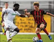  ?? DAKOTA WILLIAMS/ ATLANTA UNITED ?? Jackson Conway ( right) is training with the first team as it preps to play Club America in the second leg of the Champions League on Dec. 16.