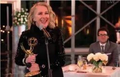  ?? Associated Press ?? Catherine O’hara accepts the Emmy for Outstandin­g Lead Actress in a Comedy Series for ‘Schitt’s Creek’.