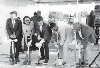  ?? ?? President Irfaan Ali (second from right) along with Andres Botero (centre), the Minister of Tourism Oneidge Walrond (second from left), and G- Invest CEO Peter Ramsaroop (left) turning the sod for the Four Points by Sheraton Hotel at Houston on July 19, 2022. (Office of the President photo)