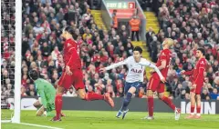  ?? AFP ?? Tottenham’s Son Heung-Min, centre, celebrates after scoring against Liverpool.