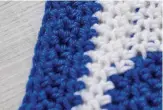  ??  ?? The blue edging is made up of half trebles on the first and last sets of three rows