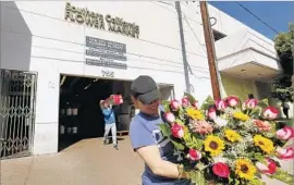  ?? Al Seib Los Angeles Times ?? THE PROJECT is the latest investment in an area that until recently was left out of downtown’s developmen­t boom. Above, Jazmin Vivar with f lowers for her mom.