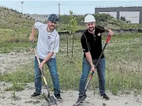  ?? DANIEL DORIGIOLA ?? Managers Mark Dal Bello, left, and Daniel Dorigiola break ground at Venetian Meat’s new proposed site for a 38,000-square-foot meat processing plant in Stoney Creek.