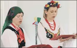  ??  ?? Celebratio­n: Singers performing traditiona­l Polish songs to the sound of an accordion during the Polish Heritage event at Peterborou­gh Museum. (METP-06-05-12AL114) Picture: ANDY LAITHWAITE.