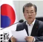  ??  ?? Moon Jae-in presides over a meeting of the National Security Council at the presidenti­al Blue House in Seoul, South Korea.