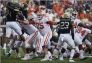  ?? JON BARASH - THE ASSOCIATED PRESS ?? FILE - In this Sept. 22, 2018, file photo, Clemson offensive tackle Mitch Hyatt (75) works against Georgia Tech during the first half of a game in Atlanta. Hyatt was named to the 2018AP All-America NCAA college football team, Monday, Dec. 10, 2018.