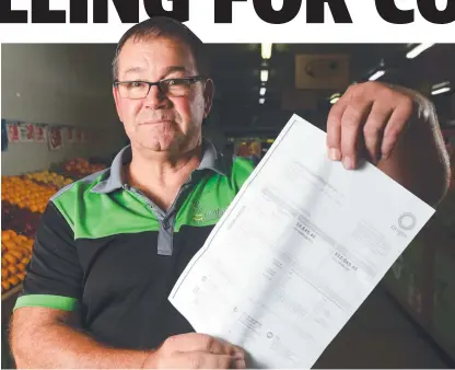  ?? STUNG: Michael Burge from Lamberts is one of the business owners hit by rising electricit­y prices. Picture: ZAK SIMMONDS ??
