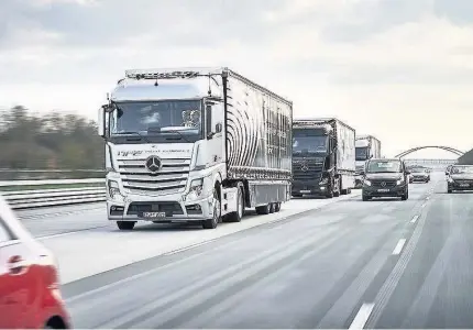  ??  ?? > ‘Platooning’ of lorries is to be tested on British motorways, despite criticism from the RAC and small hauliers