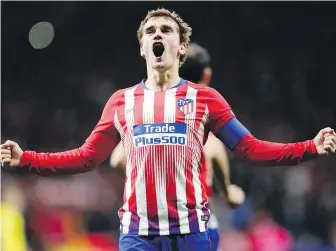  ??  ?? Atletico Madrid’s Antoine Griezmann celebrates after scoring his side’s second goal against Borussia Dortmund in Madrid on Tuesday.