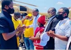  ??  ?? President Lungu talks to NERIA’S Investment­s Limited General Manager Martin Chaikatish­a (R) upon arrival at Mfuwe Airport, Before proceeding to visit a cashew nut farm, the clergy and traditiona­l leaders in Mambwe District on Friday.