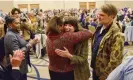  ?? Photograph: Taylor ?? Marie Gluesenkam­p Perez (centre, facing) hugs supporters as her husband looks on at an election party in Vancouver, Washington, this week.