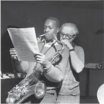  ?? (Studio Hamburg Enterprise­s) ?? BLUE NOTE co-founder Alfred Lion (right) with saxophonis­t Hank Mobley.