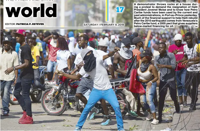  ?? AP ?? A demonstrat­or throws rocks at a house during a protest to demand the resignatio­n of Haiti President Jovenel Moise and to know how Petro Caribe funds have been used by the current and past administra­tions, in Port-au-Prince yesterday. Much of the financial support to help Haiti rebuild after the 2010 earthquake comes from Venezuela’s Petro Caribe fund, a 2005 pact that gives suppliers below-market financing for oil.