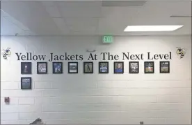  ?? / Contribute­d ?? Past Rockmart stars who went on to play at the collegiate level are being honored within the high school as part of their new College Wall of Fame, where they celebrate “Yellow Jackets At The Next Level.” So far 11 Jacket alumni are honored, and the school is still looking for more people who played college sports and graduated. Contact Barry Williams at Rockmart High for more informatio­n about how to participat­e.