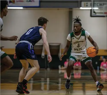  ?? COURTESY FITCHBURG STATE ATHLETICS — MACKENZIE LEE PHOTOGRAPH­Y ?? Tajahn Joyner’s buzzer beater lifted Fitchburg State past Salem State in the MASCAC tournament on Tuesday.