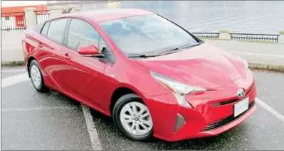  ??  ?? The fourth generation, 2016 Toyota Prius sedan (Base model shown) moves up to mid-size with edgy new styling and a 4.5L/100 km combined fuel rating.