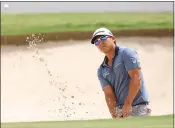  ?? RICHARD HEATHCOTE — GETTY IMAGES ?? Chico golfer Kurt Kitayama plays from a greenside bunker on the third hole during the third round of the Commercial Bank Qatar Masters on March 13in Doha, Qatar.