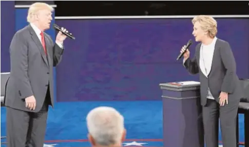  ?? // REUTERS ?? Trump y Clinton, durante un debate en octubre de 2016