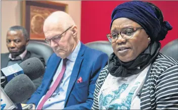  ?? CP PHOTO ?? Evelyne Mavoungou-Tsonga and Jean-Claude Moukoko, left, parents of Blessing Moukoko ,and lawyer Jean-Pierre Menard, centre, attend a news conference in Montreal Wednesday.