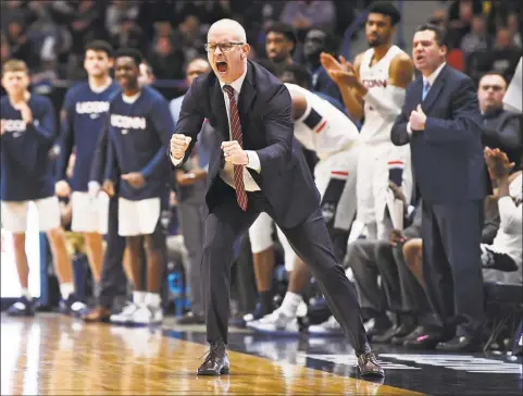  ?? Jessica Hill / Associated Press ?? UConn coach Dan Hurley reacts during the second half of a game against Cincinnati on Sunday, Feb. 24 in Hartford.
